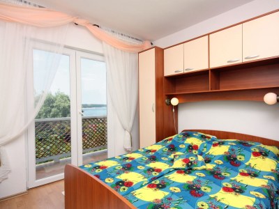 Apartment Two bedroom apartment with balcony and sea view Supetarska Draga - Gonar, Rab A-4999-a - Outdoor photo 19