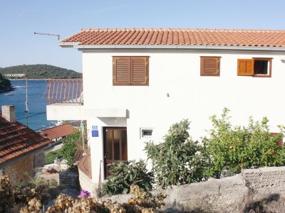 Apartment Two bedroom apartment with balcony and sea view Maslinica, Šolta A-5188-a - Outdoor photo 2