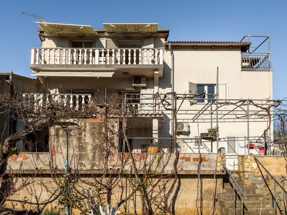 Apartment Two bedroom apartment with terrace Lopar, Rab A-14070-b - Outdoor photo 4