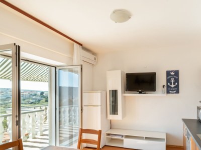 Apartment Two bedroom apartment with terrace Lopar, Rab A-14070-b - Outdoor photo 9