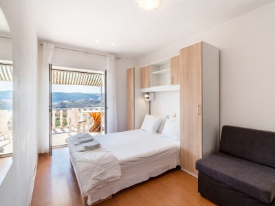 Apartment Two bedroom apartment with terrace Lopar, Rab A-14070-b - Outdoor photo 12