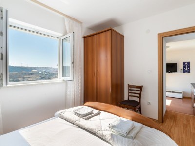 Apartment Two bedroom apartment with terrace Lopar, Rab A-14070-b - Outdoor photo 15