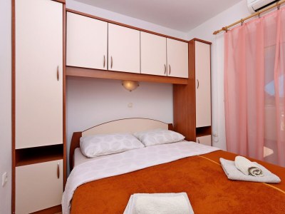 Apartment Two bedroom apartment with terrace Lopar, Rab A-14804-d - Outdoor photo 16