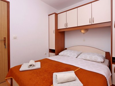 Apartment Two bedroom apartment with terrace Lopar, Rab A-14804-d - Outdoor photo 17