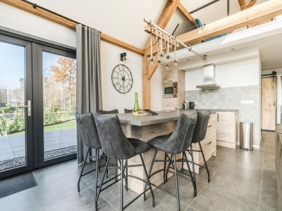 Holiday park Modern bungalow in Baarle-Nassau with pond view - Features photo 11