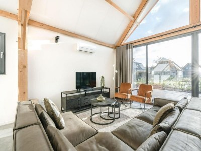 Holiday park Modern bungalow in Baarle-Nassau with pond view - Features photo 14