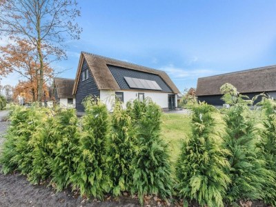 Holiday park Modern bungalow in Baarle-Nassau with pond view - Environment photo 25