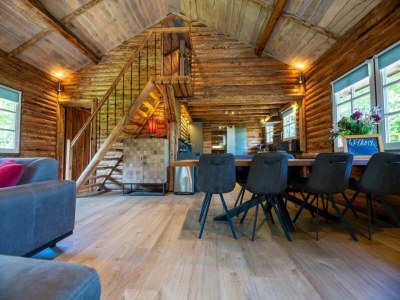 Holiday park Spacious wooden chalet with covered terrace - Features photo 7