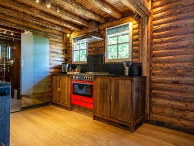 Holiday park Spacious wooden chalet with covered terrace - Features photo 10