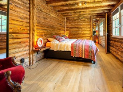 Holiday park Spacious wooden chalet with covered terrace - Features photo 12