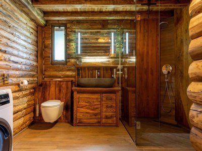 Holiday park Spacious wooden chalet with covered terrace - Features photo 19