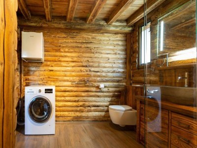 Holiday park Spacious wooden chalet with covered terrace - Features photo 22