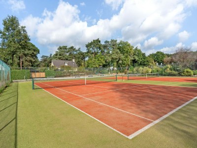 Holiday park Spacious wooden chalet with covered terrace - Outdoor photo 23