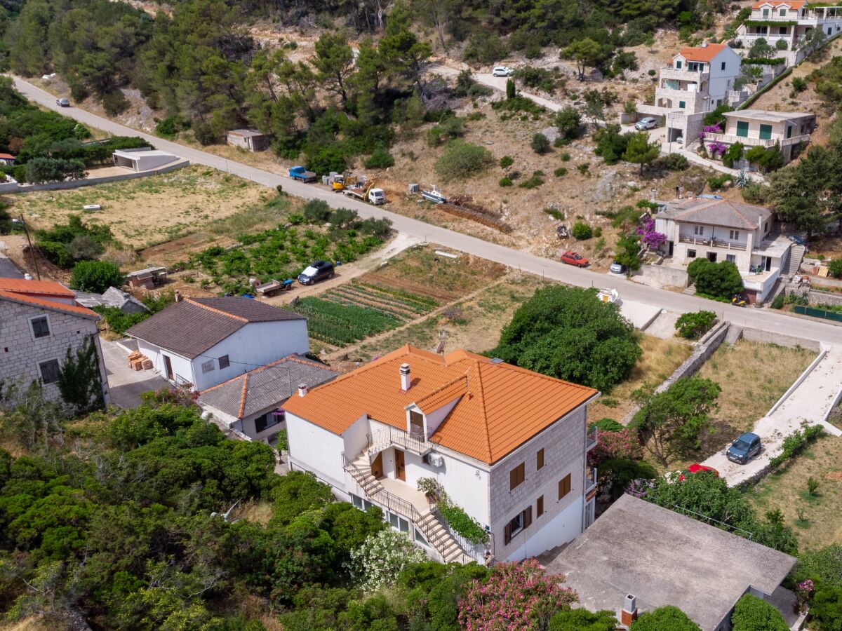 Apartment Three bedroom apartment with terrace and sea view Povlja, Brač A-16792-a - Outdoor photo 5