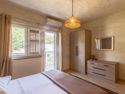 Apartment Three bedroom apartment with terrace and sea view Povlja, Brač A-16792-a - Outdoor photo 22