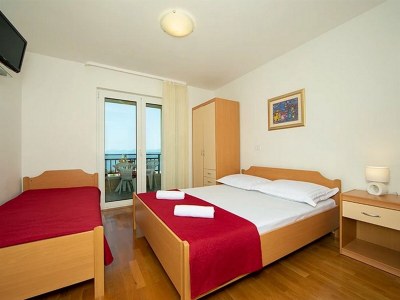 Apartment Two bedroom apartment with terrace and sea view Igrane, Makarska A-17292-a - Outdoor photo 9