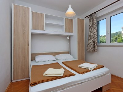 Apartment Two bedroom apartment with terrace and sea view Rab A-20222-b - Outdoor photo 21