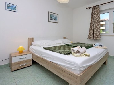 Apartment Two bedroom apartment with terrace and sea view Rab A-20222-c - Outdoor photo 21