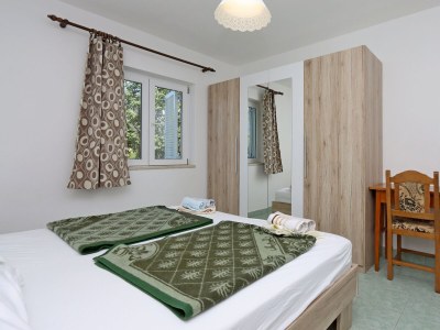 Apartment Two bedroom apartment with terrace and sea view Rab A-20222-c - Outdoor photo 22