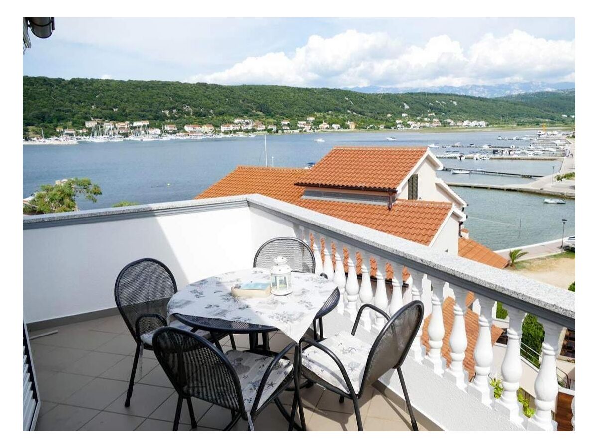 Apartment Two bedroom apartment with terrace and sea view Supetarska Draga - Donja, Rab A-22365-e