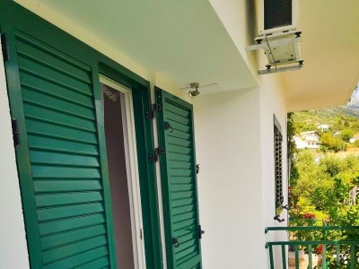 Apartment Two bedroom apartment with terrace and sea view Brist, Makarska A-22463-a - Outdoor photo 25