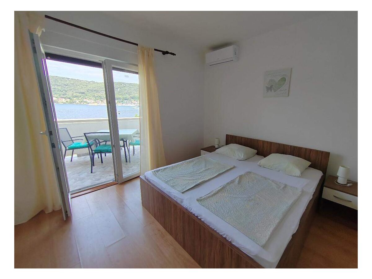 Apartment One bedroom apartment near beach Supetarska Draga - Donja, Rab A-23377-c