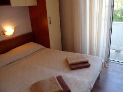 Apartment Two bedroom apartment with terrace and sea view Kampor, Rab A-24838-a - Outdoor photo 16