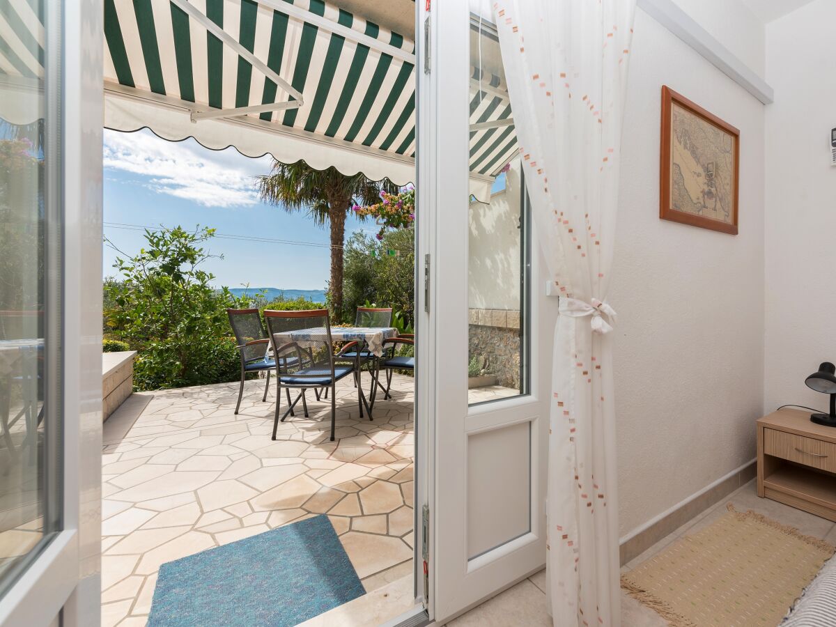 Apartment Studio flat with terrace and sea view Brela, Makarska AS-20186-a