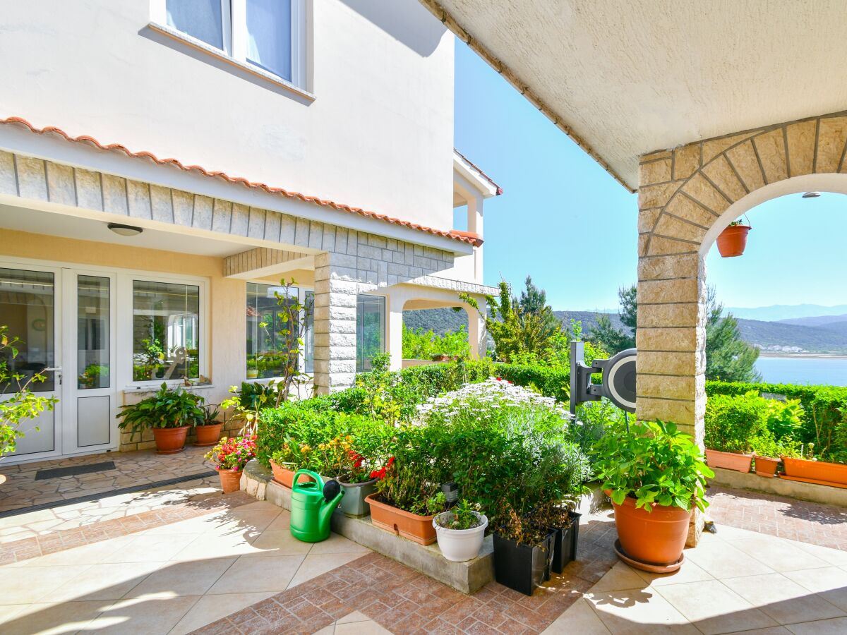 Apartment Two bedroom apartment with terrace and sea view Supetarska Draga - Donja, Rab A-2013-c