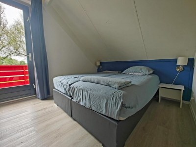 Holiday house Bungalow mit Terrasse und Seeblick - Features photo 8