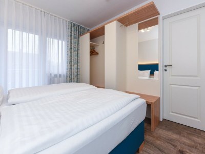 Apartment Gemütliche Ferienwohnung mit Balkon - Features photo 15