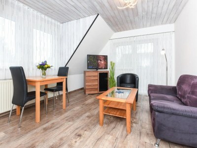 Apartment Gemütliche Ferienwohnung mit Balkon - Features photo 17