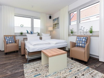 Apartment Ferienwohnung mittendrin in Bensersiel - Features photo 23