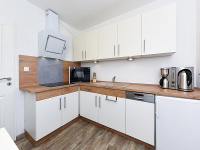 Apartment Ferienwohnung mittendrin in Bensersiel - Features photo 35