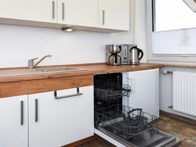 Apartment Ferienwohnung mittendrin in Bensersiel - Features photo 36