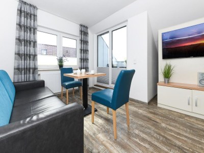 Apartment Ferienwohnung mit Balkon in Bensersiel - Features photo 19