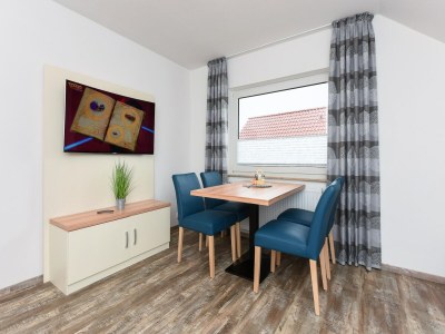 Apartment Ferienwohnung mit Balkon in Bensersiel - Features photo 21