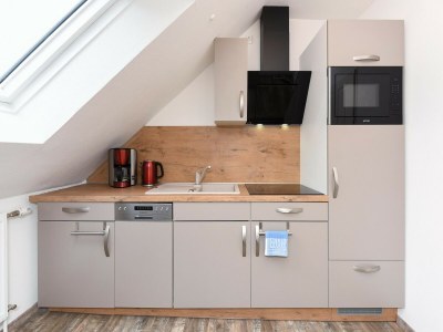 Apartment Ferienwohnung mit Balkon in Bensersiel - Features photo 31