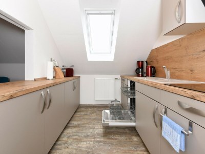 Apartment Ferienwohnung mit Balkon in Bensersiel - Features photo 32