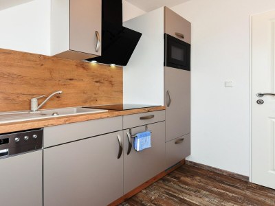 Apartment Ferienwohnung mit Balkon in Bensersiel - Features photo 33
