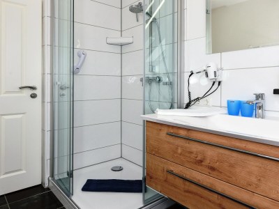 Apartment Ferienwohnung mit Balkon in Bensersiel - Features photo 35