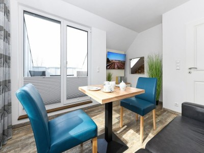 Apartment Ferienwohnung mit Balkon in Bensersiel - Features photo 43