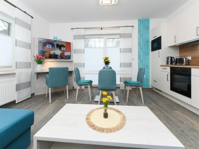 Apartment Moderne Ferienwohnung mit Terrasse in ruhiger Lage - Features photo 7