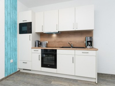 Apartment Moderne Ferienwohnung mit Terrasse in ruhiger Lage - Features photo 29