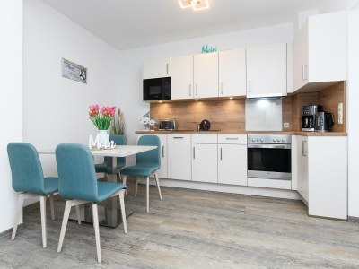 Apartment Komfortable Ferienwohnung mit Terrasse; Bensersiel - Features photo 3