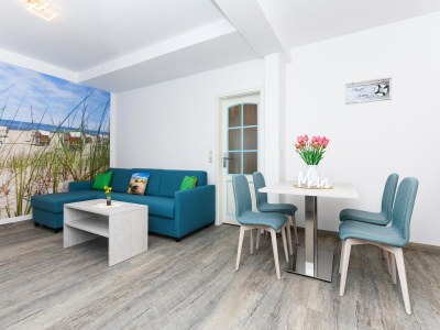 Apartment Komfortable Ferienwohnung mit Terrasse; Bensersiel - Features photo 10
