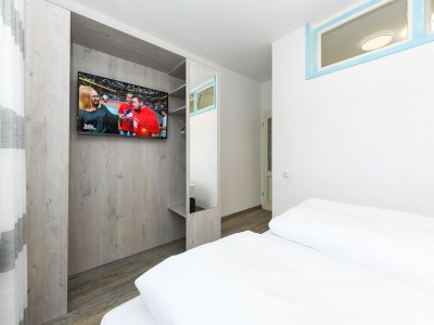 Apartment Komfortable Ferienwohnung mit Terrasse; Bensersiel - Features photo 16