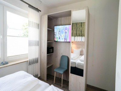 Apartment Komfortable Ferienwohnung mit Terrasse; Bensersiel - Features photo 17