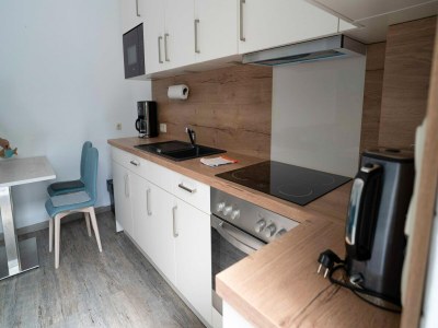 Apartment Komfortable Ferienwohnung mit Terrasse; Bensersiel - Features photo 32