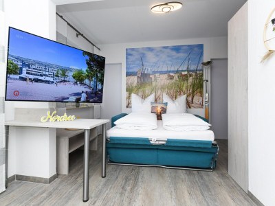 Apartment Helle Ferienwohnung in Bensersiel - Features photo 11